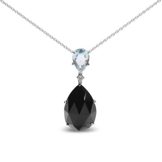 Front view of a white metal necklace with a pear-shaped blue gemstone at the top, a small round white gemstone below it, and a larger pear-shaped black gemstone hanging beneath.