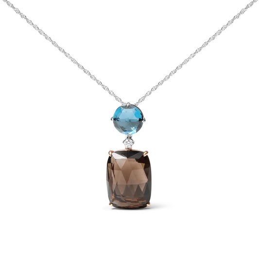Front view of a necklace with a white and rose metal setting featuring a large cushion-shaped smoky gemstone pendant hanging below a round blue gemstone and a small round white gemstone in a prong setting.