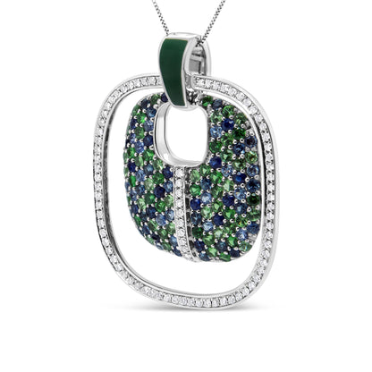 Close-up front angle of a white necklace pendant featuring an open square frame paved with white gemstones, with an inner curved square piece adorned with blue and green gemstones, and a small green enamel detail on the bail.