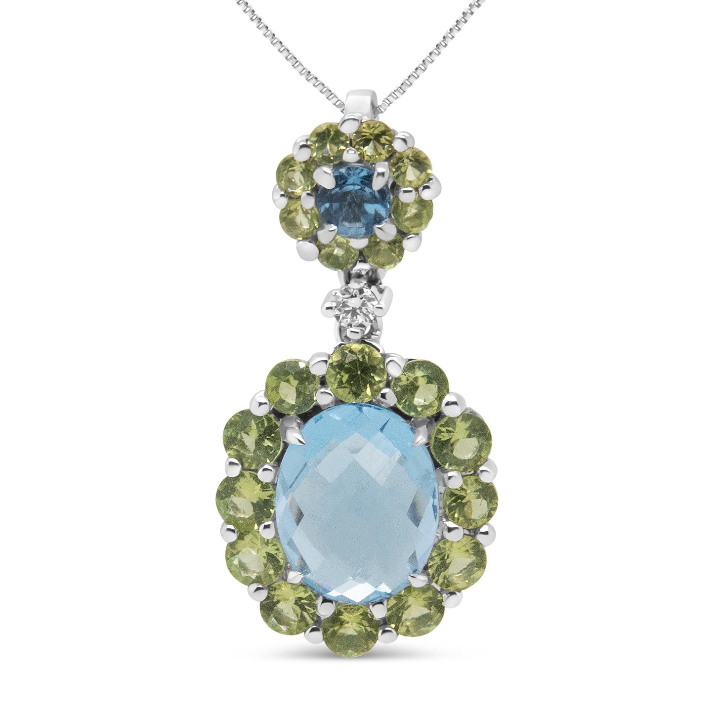 Front view of white metal necklace pendant featuring a large oval blue gemstone surrounded by round green gemstones, a smaller cluster above with a round blue gemstone surrounded by round green gemstones, and a single white gemstone connecting the two clusters.