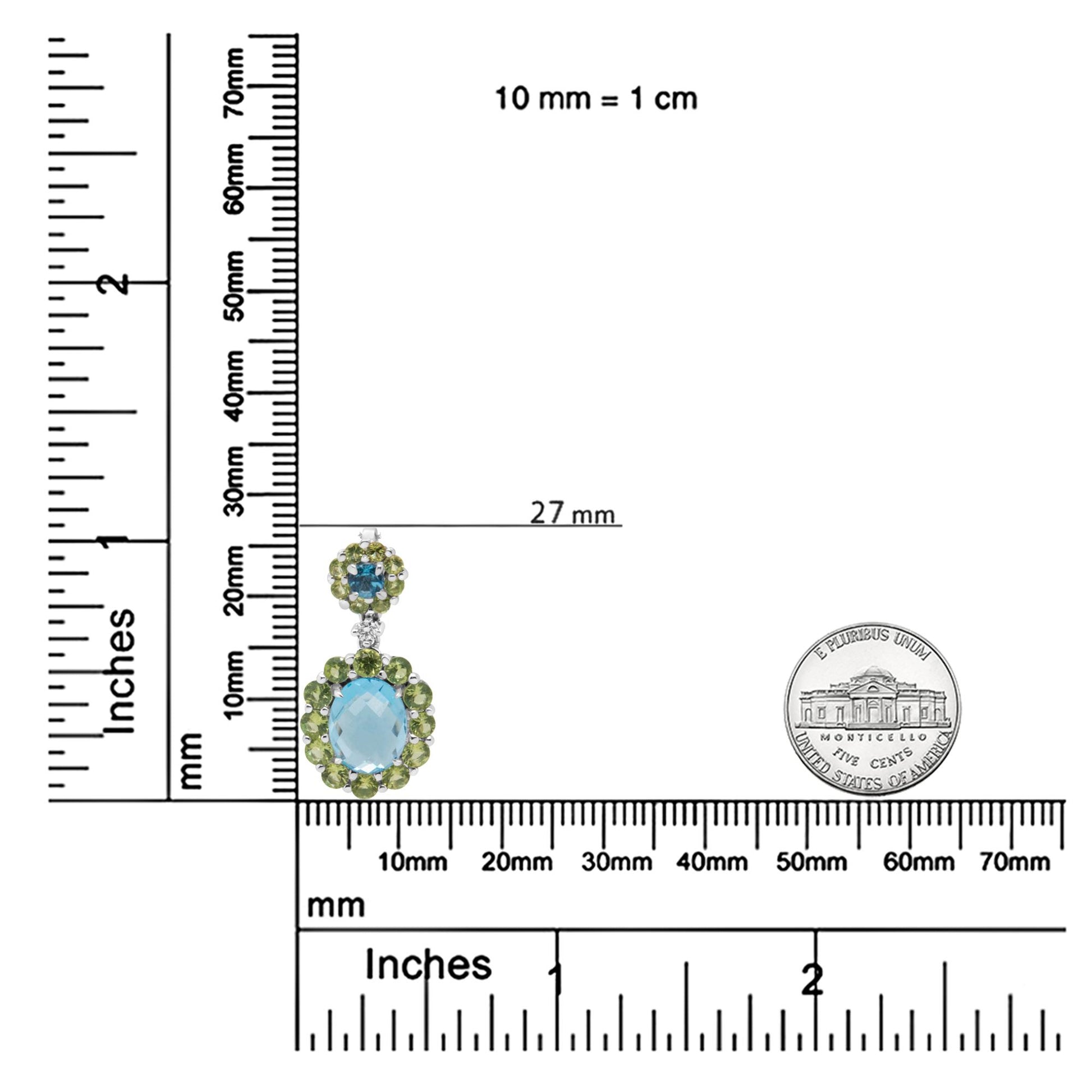 White necklace with oval and round blue gemstones and multiple round green gemstones in prong settings, photographed on a ruler and scale for size reference from a front angle.