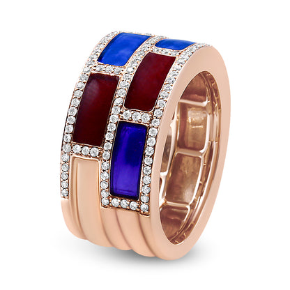 Close-up front angle of a rose-colored ring featuring rectangular blue and red inlaid sections bordered by rows of small round white gemstones in shared prong settings.
