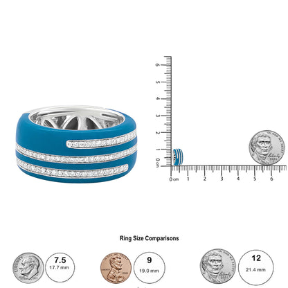 White metal ring with blue enamel and three rows of round white gemstones in pave setting, shown in a close-up angled front view, next to a ruler and coins for size reference.