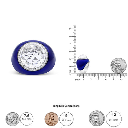 White metal ring with a large round white gemstone in bezel setting, surrounded by small round white gemstones in shared prong setting, shown from the front and side on a ruler and next to coins for size reference.