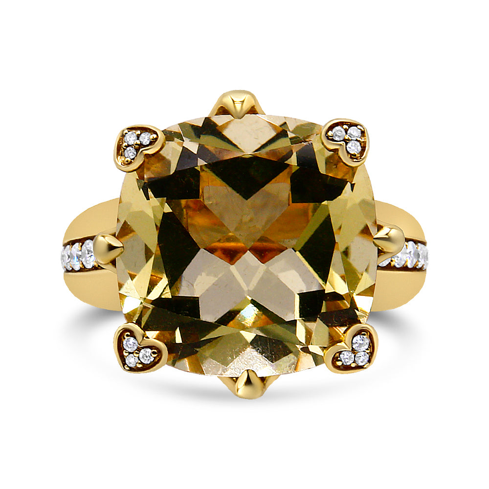 Front view of a yellow metal ring featuring a large cushion-shaped lemon-colored gemstone held by prongs with heart-shaped settings containing small white round gemstones, and additional small white round gemstones set along the band.