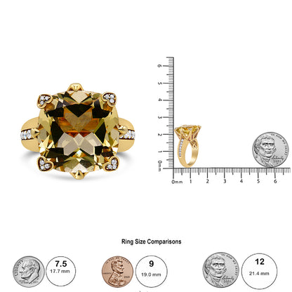 Yellow ring with a large cushion-shaped lemon-colored gemstone with white gemstones in heart-shaped prong settings at the corners and a row of white gemstones on the band, shown from front and side angles on a scale for size reference with coins.