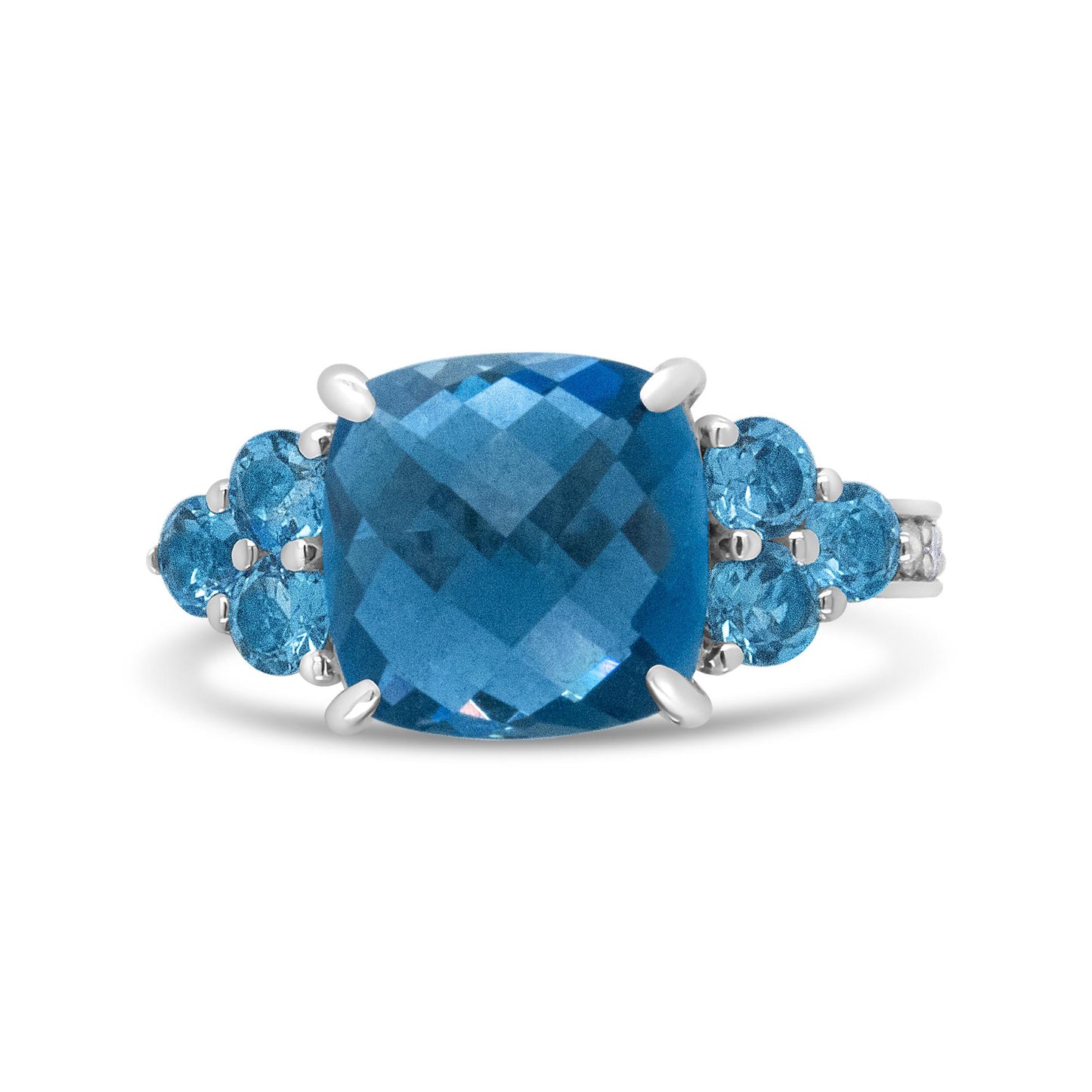 Front view of a white metal ring with a large cushion-cut blue gemstone center and smaller round blue gemstones on each side.