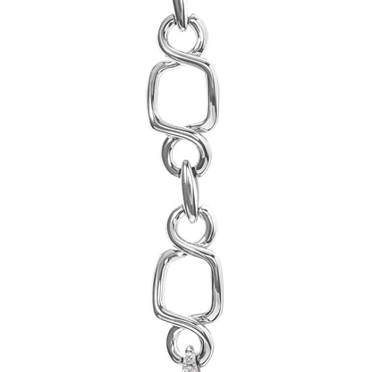 Close-up front angle of a white metal necklace chain featuring irregular square links connected by twisted loops.