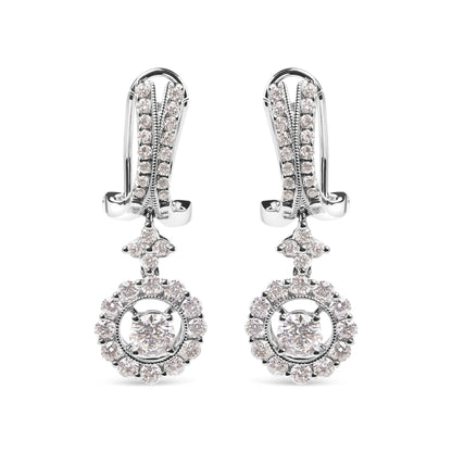 Front view of white metal drop earrings with round white gemstones in prong settings, featuring a small cluster above a circular gemstone halo with a larger central gemstone.