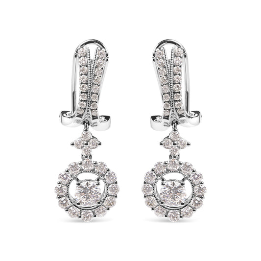 Front view of white metal drop earrings with round white gemstones in prong settings, featuring a small cluster above a circular gemstone halo with a larger central gemstone.