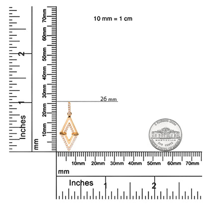 Yellow metal necklace pendant with geometric design and round white gemstones in prong settings, shown on a ruler and scale from a front angle.