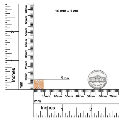 Yellow necklace pendant with a pyramid shape featuring white round gemstones in pave setting, shown on a ruler for size reference, top-down angle.