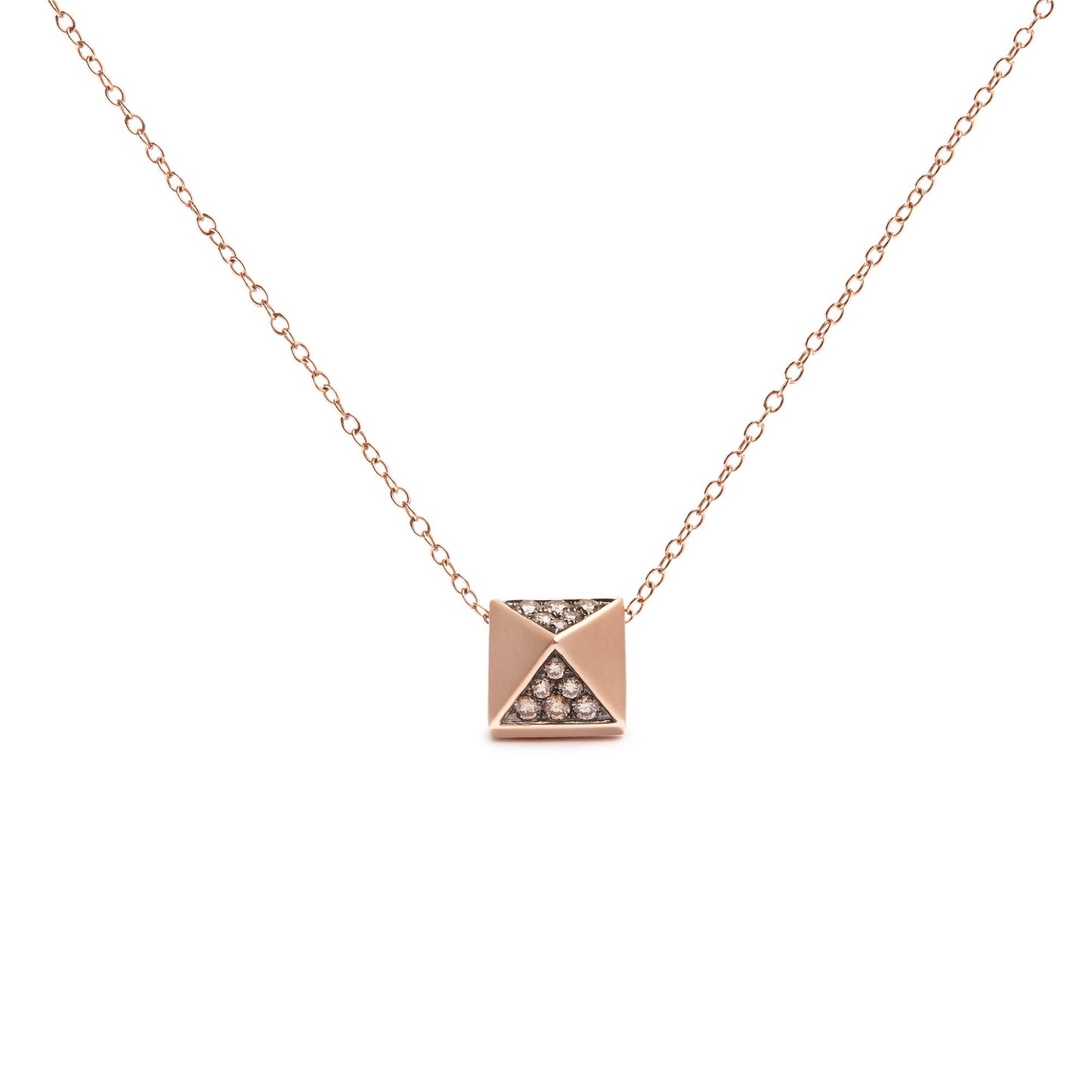 Front-facing shot of a rose-colored metal necklace with a square pendant featuring triangular sections, two of which are inset with round brown gemstones in a pave setting.