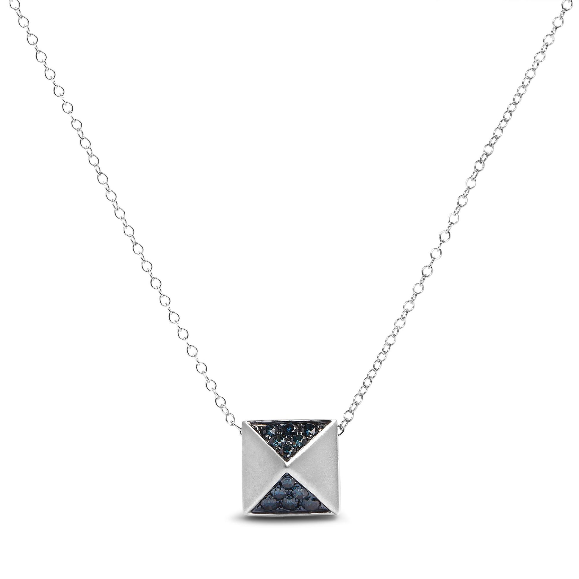 Front-facing view of a white necklace with a square pendant featuring pave-set round blue gemstones on two triangular sections.