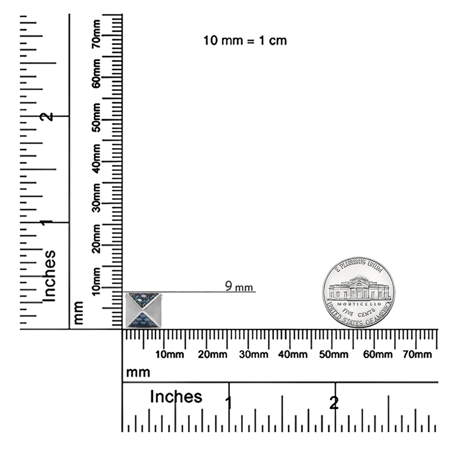 White metal necklace pendant with triangular sections set with round blue gemstones, shown on a ruler for size reference, top-down angle.