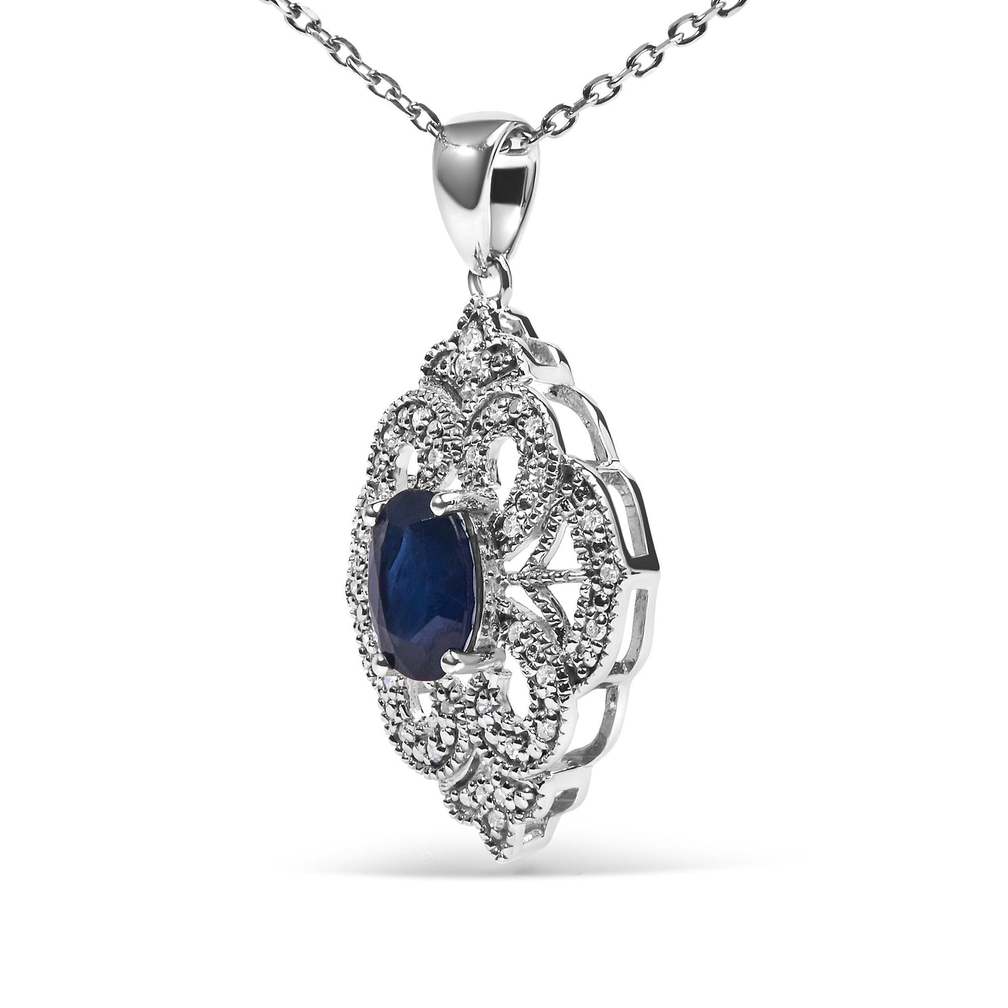 Close-up side angle of a white necklace pendant featuring an oval blue gemstone surrounded by small round white gemstones in shared prong settings.