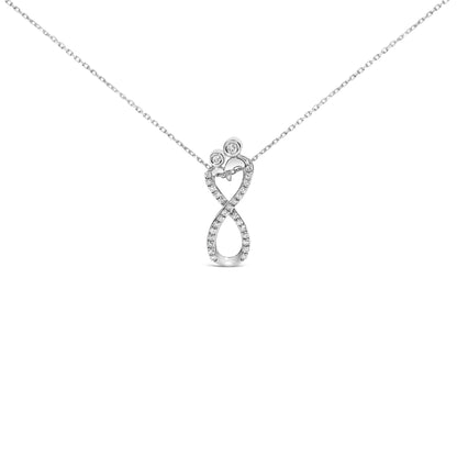 Front view of a white metal necklace pendant in an infinity loop shape, adorned with round white gemstones in bezel and shared prong settings along the loop.