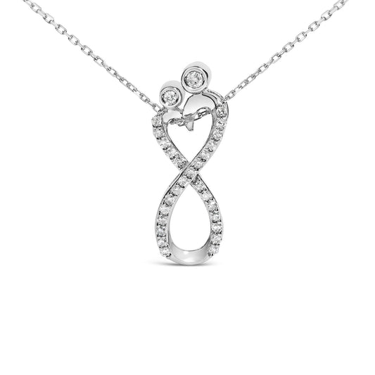 Front-facing close-up of a white metal necklace pendant shaped like an infinity symbol with two round white gemstones in bezel settings at the top and multiple smaller round white gemstones in shared prong settings along the twisted curves.