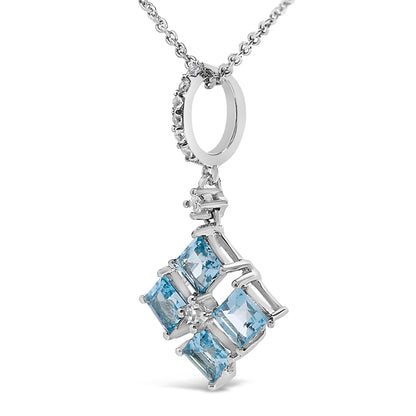 Close-up front angle of a white necklace pendant featuring four square blue gemstones arranged in a diamond shape surrounding a single round white gemstone, with additional round white gemstones set in the circular bail, shown against a white background.