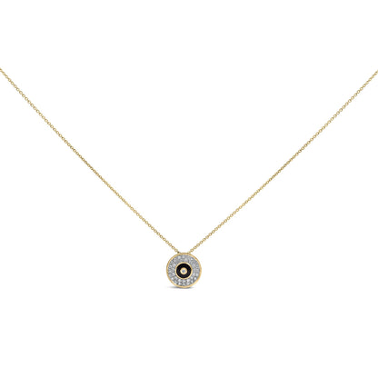 Close-up front view of a yellow chain necklace with a round pendant featuring a bezel-set center white gemstone surrounded by prong-set white gemstones.