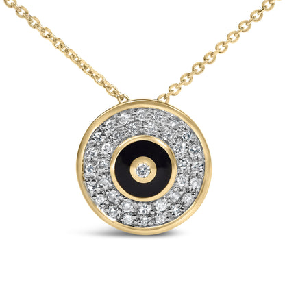 Close-up front angle of a yellow metal necklace with a circular pendant, featuring a center black circle outlined with a round white gemstone in bezel setting, surrounded by numerous small round white gemstones in prong settings, shown on a white background.
