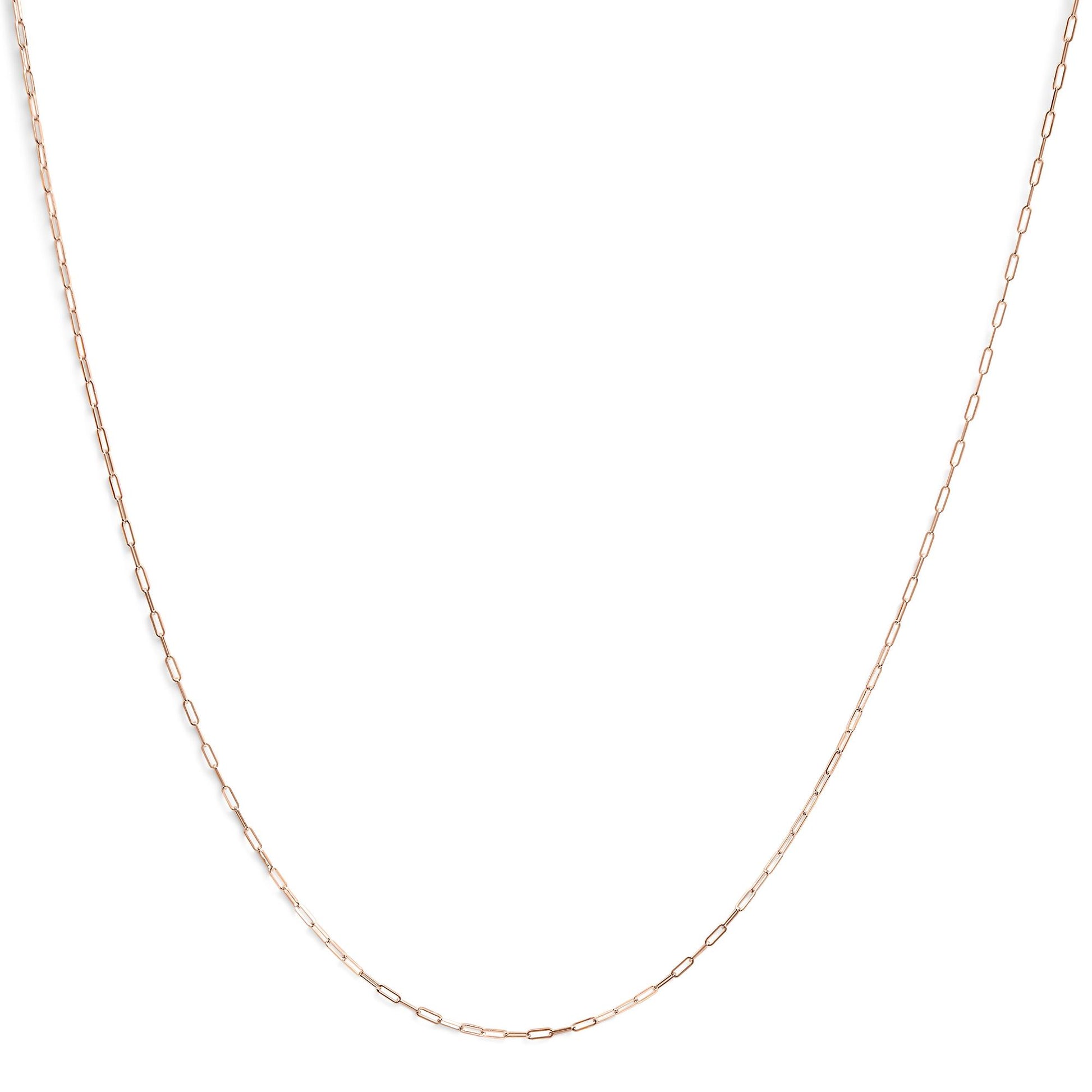 Close-up front view of a delicate rose chain with elongated links laid flat on a white background.