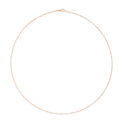 Top-down view of a rose-colored metal chain with elongated rectangular links and a clasp.