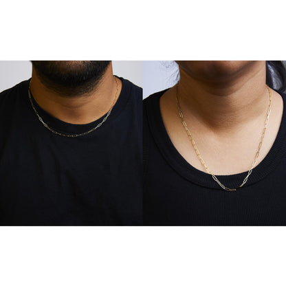 Close-up front view of two yellow metal chain necklaces with elongated links, one worn by a person in a black shirt and the other by a person in a black tank top.