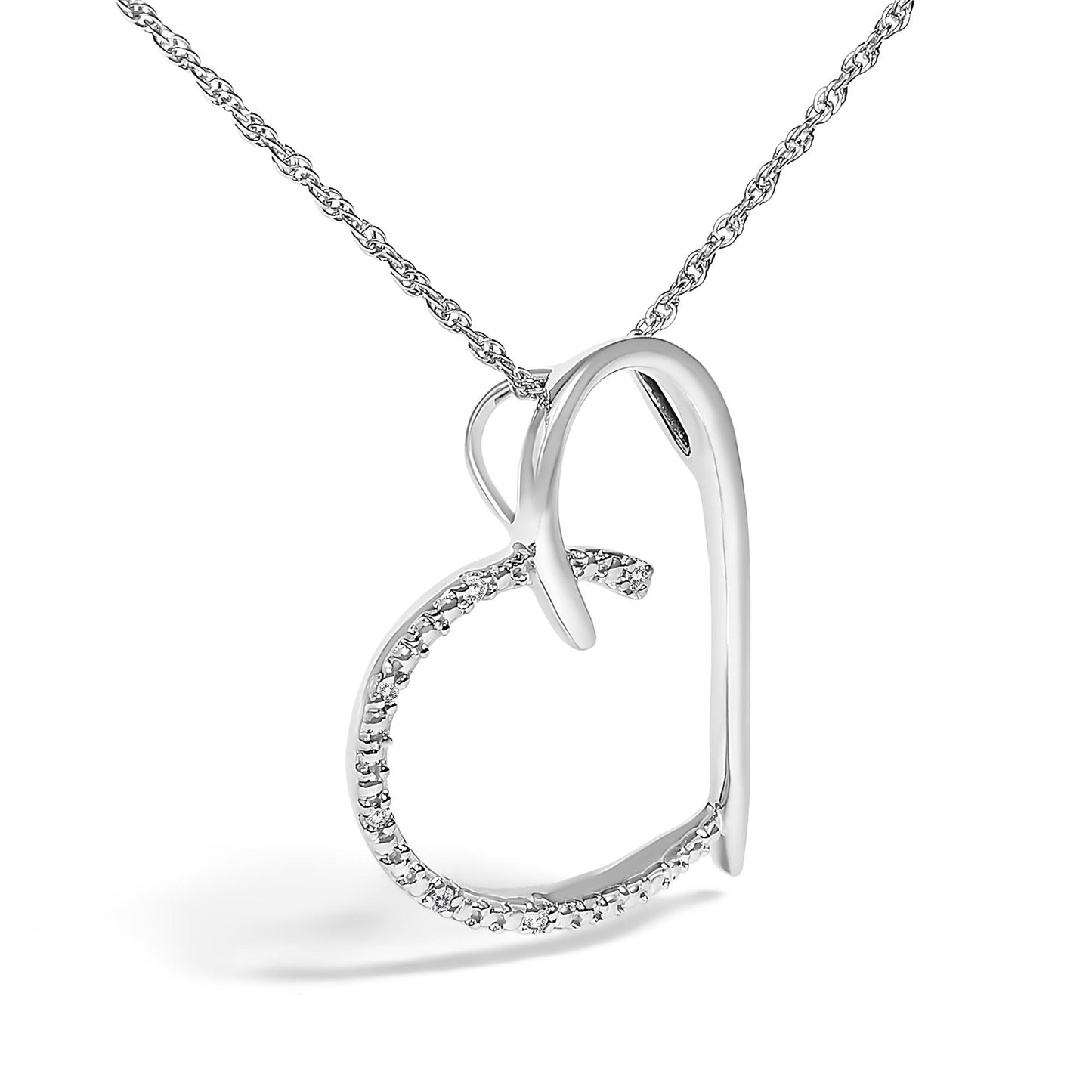 Close-up front angle of a white metal necklace with an open heart-shaped pendant partially adorned with small round white gemstones in prong settings.