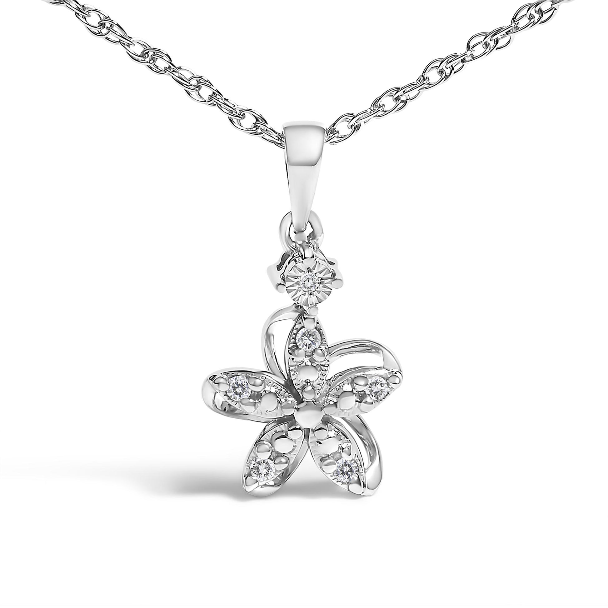 Front angle of a white metal necklace with a flower-shaped pendant featuring six round white gemstones in prong settings.