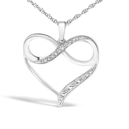 Front view of a white metal open heart-shaped necklace pendant with an infinity loop design adorned with white round gemstones in prong settings.