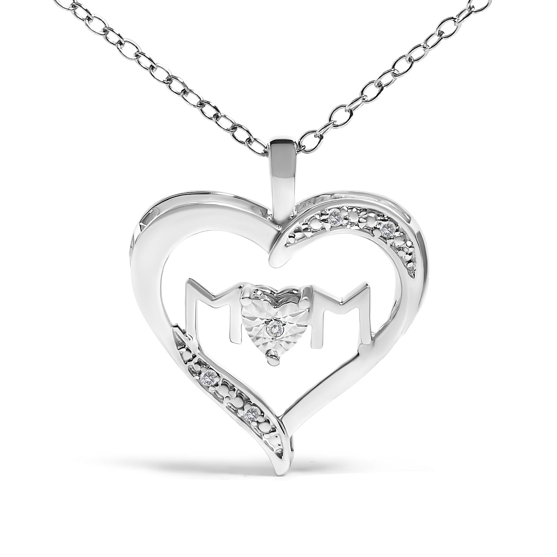 Front view of a white necklace pendant in the shape of a heart with five round white gemstones set in prongs, featuring 'M' letters on each side of a smaller heart shape in the center.