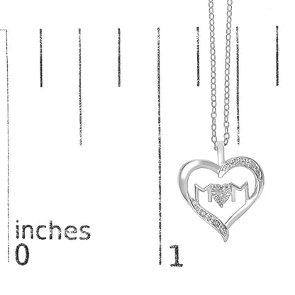 White metal necklace with heart-shaped pendant featuring five round white gemstones in prong settings, shown against a ruler for size reference, front-facing angle.