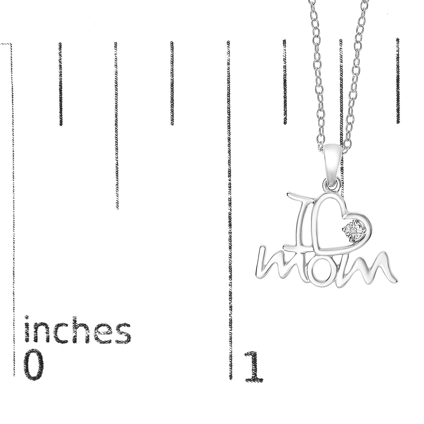 White metal necklace pendant with 'I ♥ mom' design, featuring one round white gemstone in the heart, shown against a ruler for size reference, front angle.