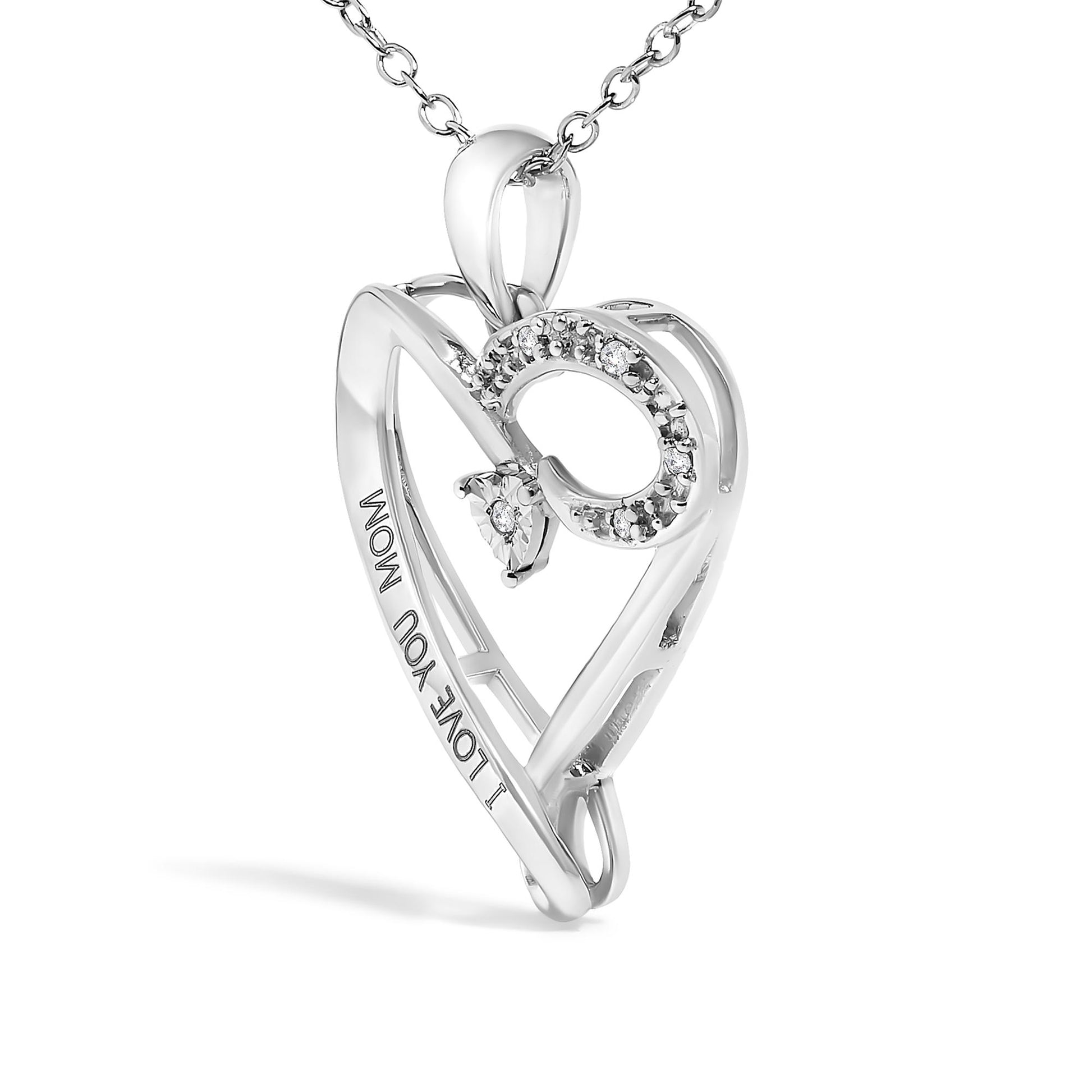 White metal heart-shaped necklace pendant with engraved 'I LOVE YOU MOM' text and accented with round prong-set white gemstones, shown in a close-up angled view.