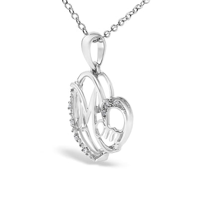 Close-up side angle of a white metal necklace pendant with a heart shape and inset round white gemstones in prong settings.