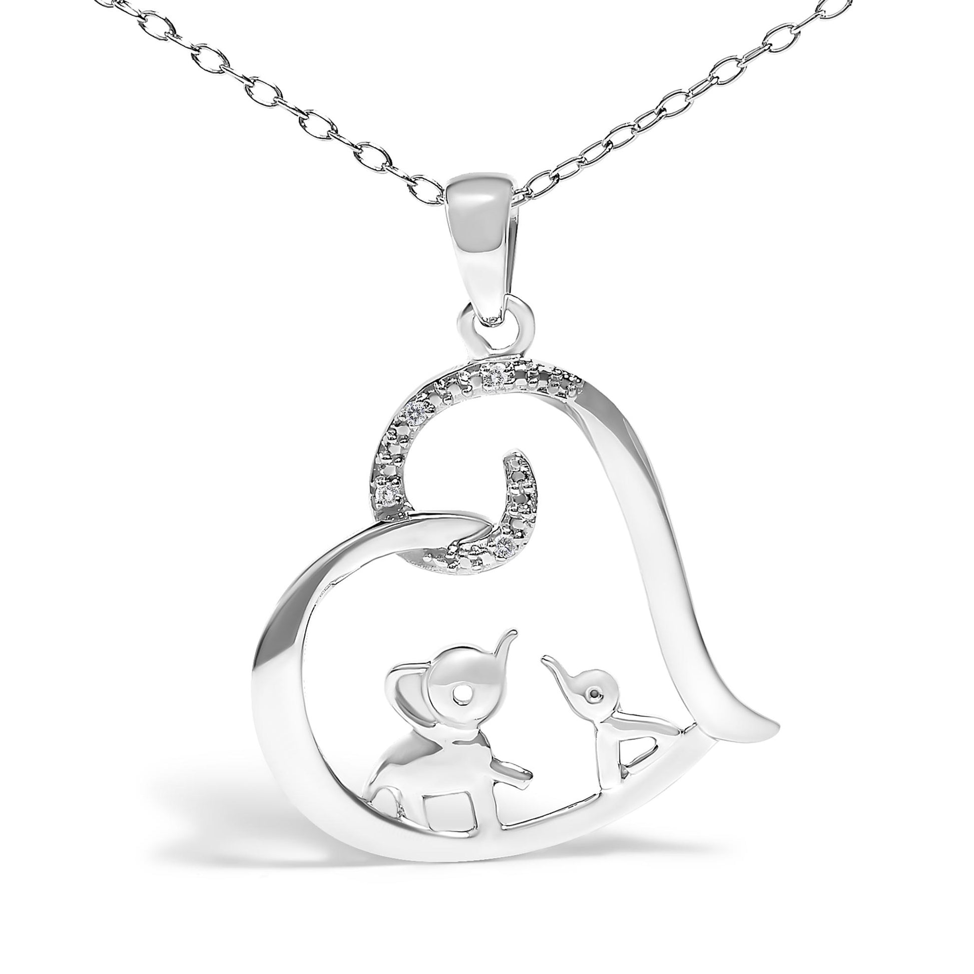 White metal necklace with a heart-shaped pendant featuring an elephant and a bird inside, accented with small round white gemstones on the upper curve, shown from the front angle.