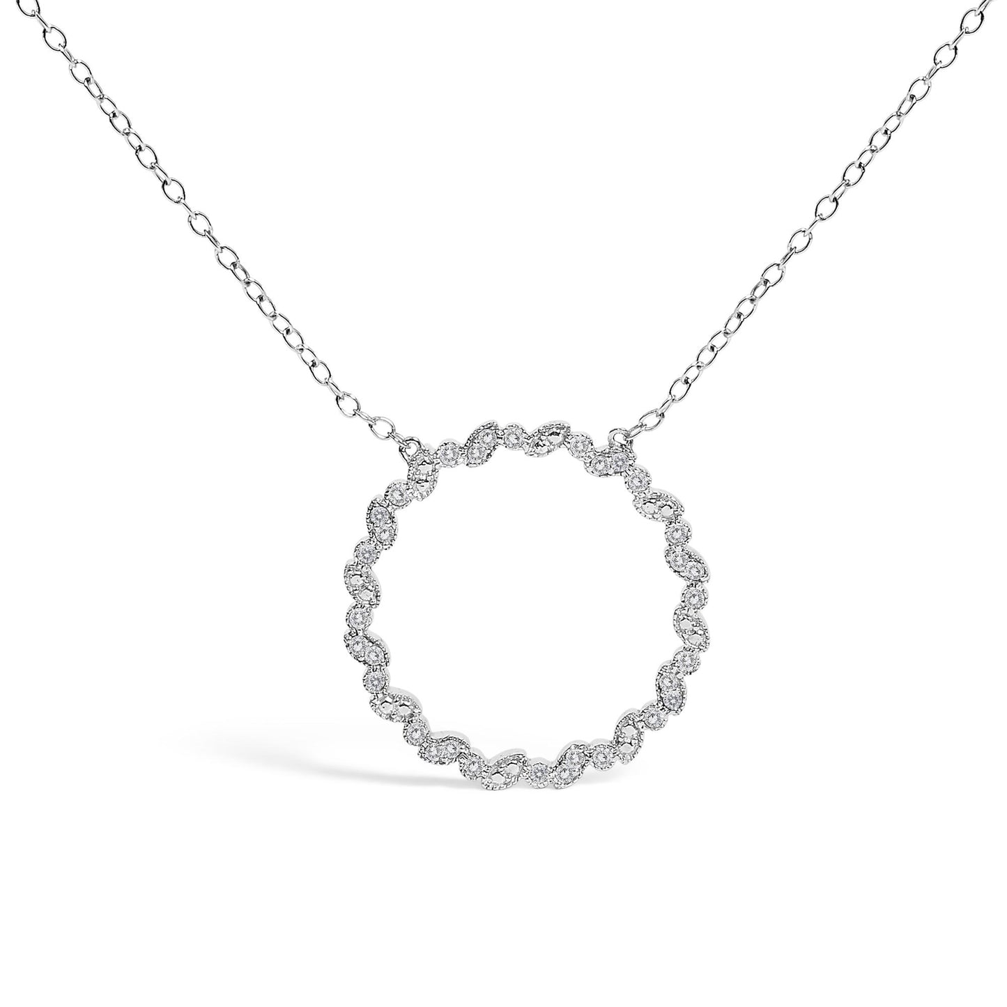 Front-facing shot of a white metal necklace with a circular pendant featuring round white gemstones in prong settings forming a continuous loop.