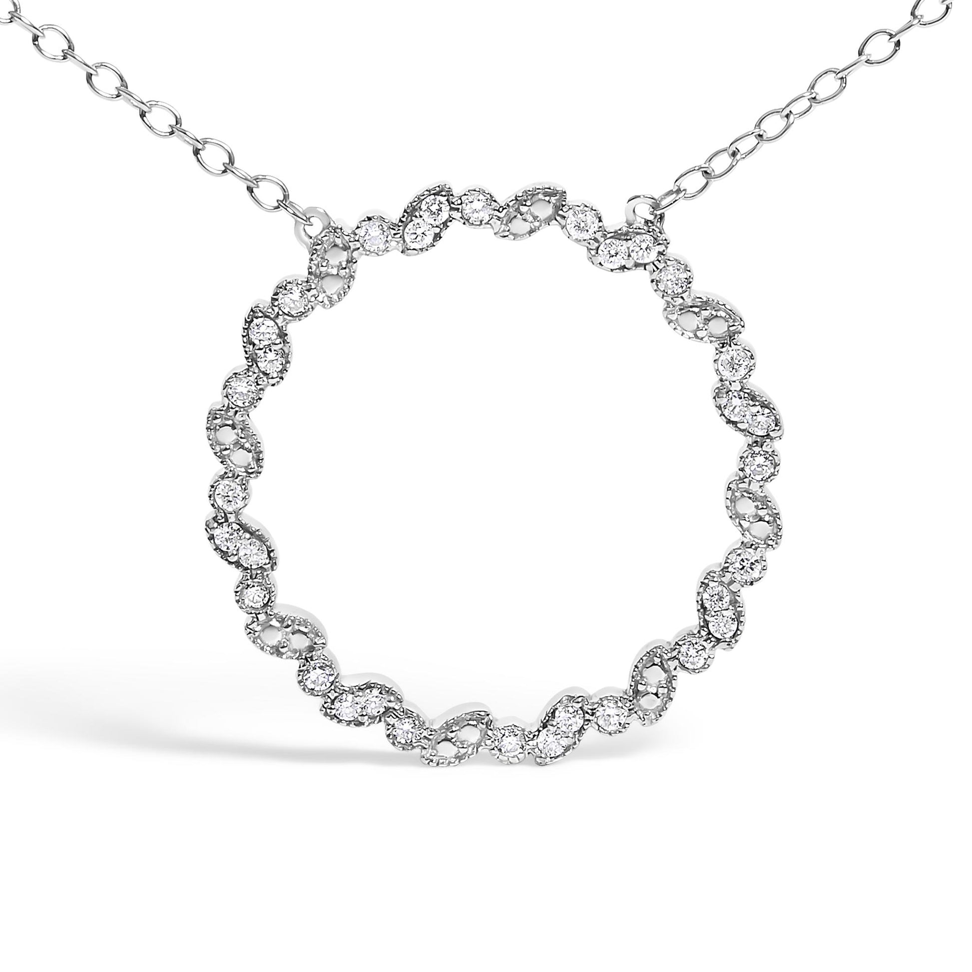 Close-up front view of a white necklace with round white gemstones in a circular linked design.