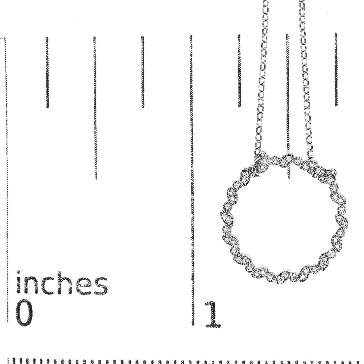 White metal necklace with a circular pendant featuring round white gemstones in prong settings, shown hanging against a ruler for size reference, photographed from the front.