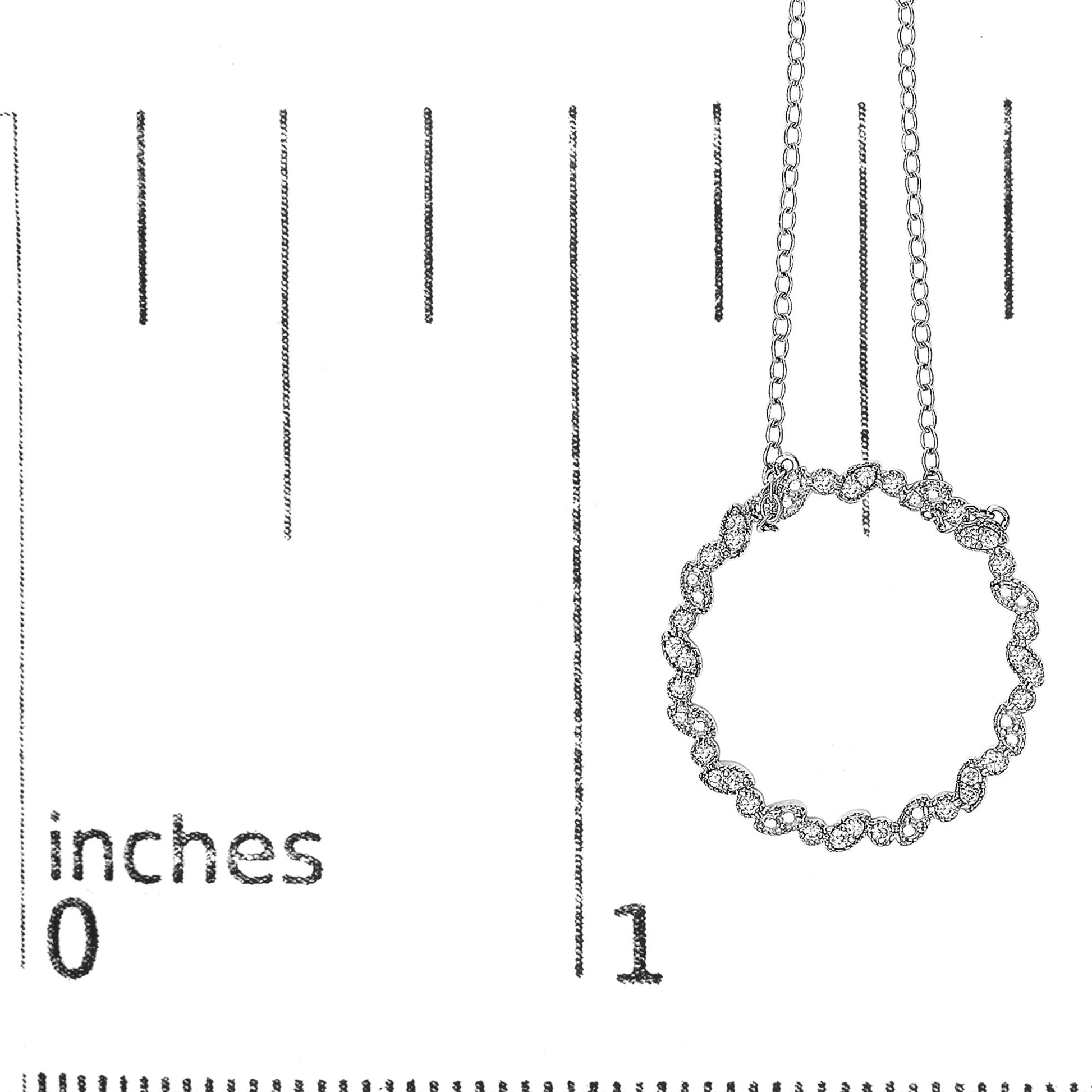 White metal necklace with a circular pendant featuring round white gemstones in prong settings, shown hanging against a ruler for size reference, photographed from the front.
