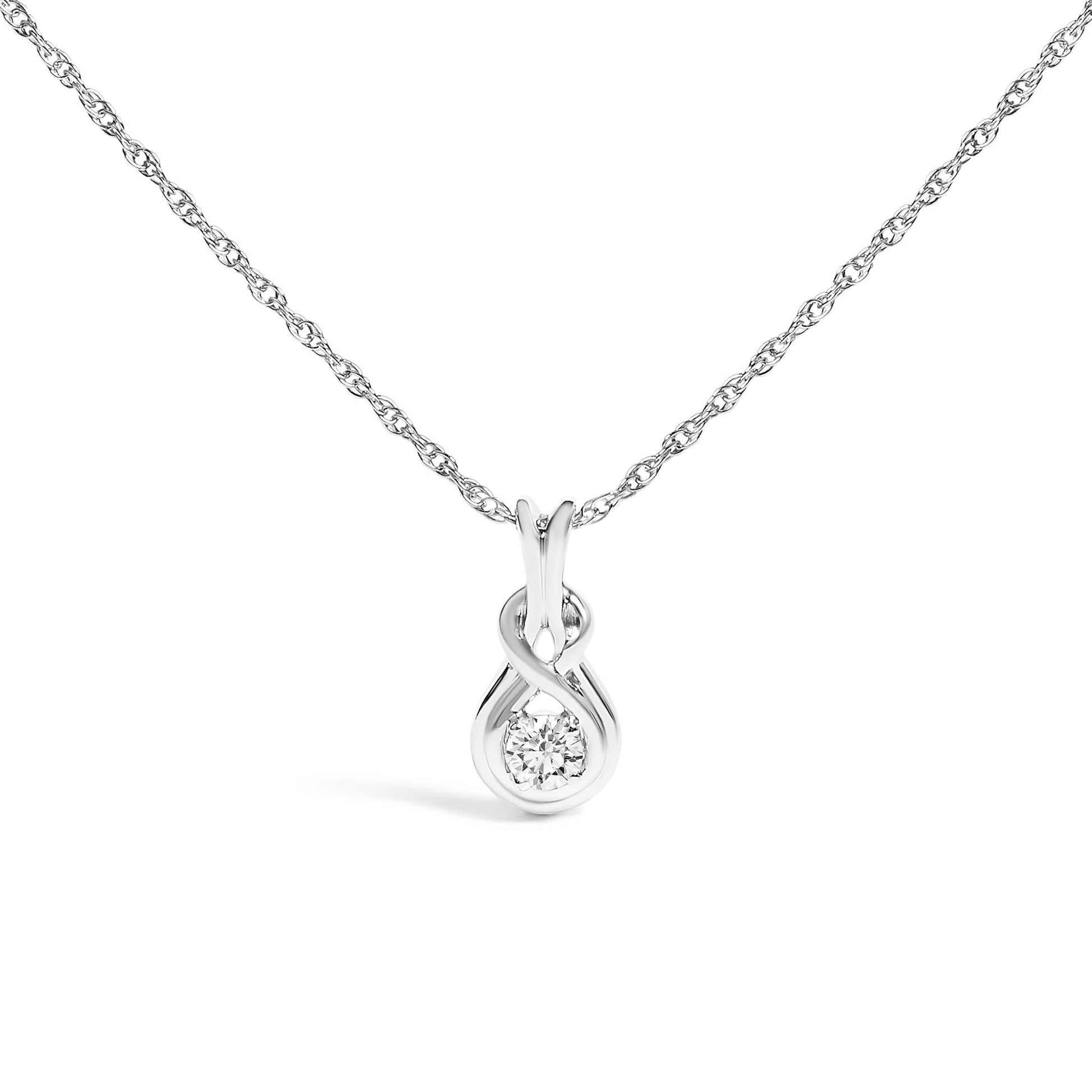 White metal necklace with a pendant featuring an infinity loop design and a single round white gemstone in prong setting, shown from a front angle on a white background.