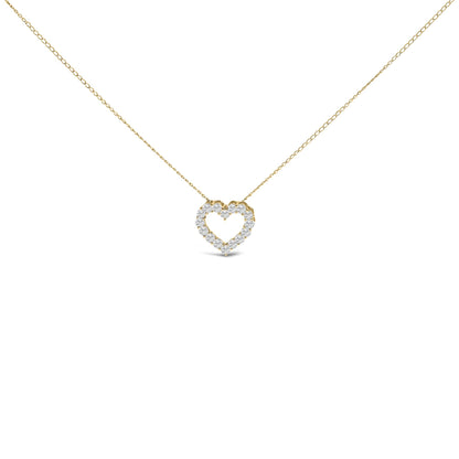 Front-facing shot of a yellow metal necklace with a heart-shaped pendant featuring round white gemstones in a shared prong setting.