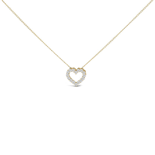 Front-facing shot of a yellow metal necklace with a heart-shaped pendant featuring round white gemstones in a shared prong setting.