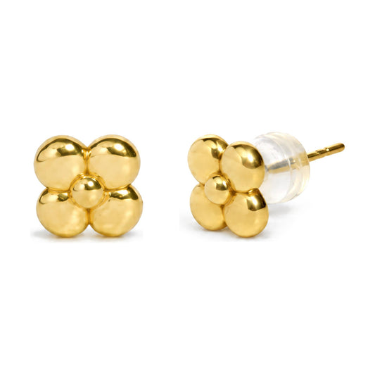 Close-up front and side view of a single pair of yellow metal stud earrings in a four-petal flower shape, with a clear backing shown on the side.