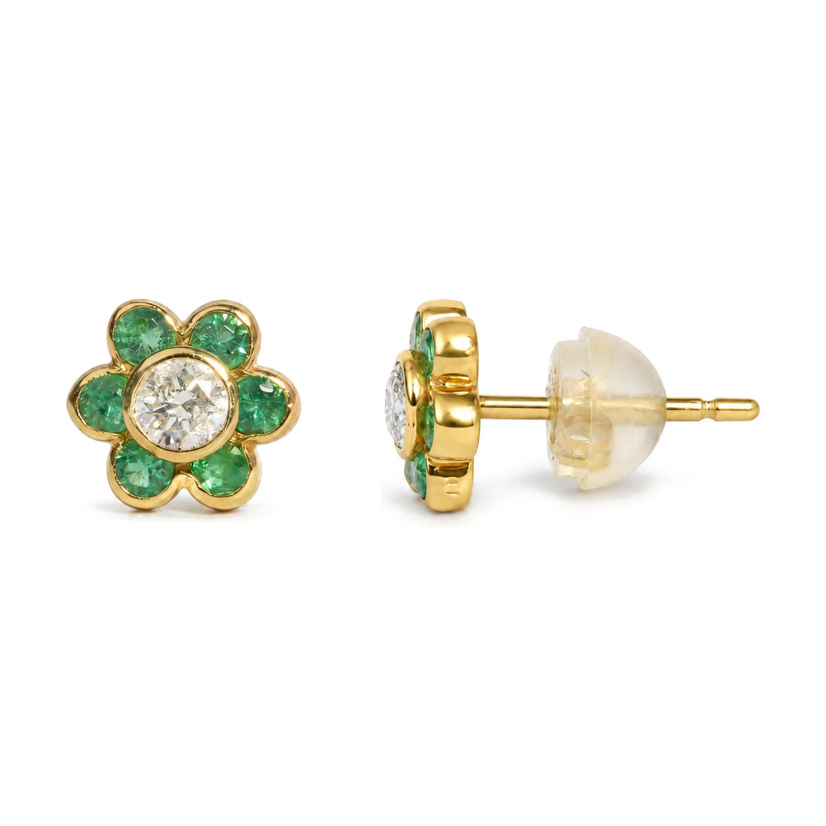 Close-up side front angle of a yellow metal flower-shaped stud earring with round white gemstone center and round green gemstones forming petals, shown on a clear earring back.
