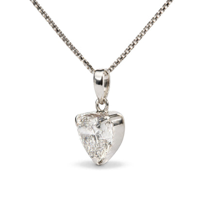 Close-up front view of a white necklace chain featuring a heart-shaped pendant with a white gemstone in a three-prong setting.