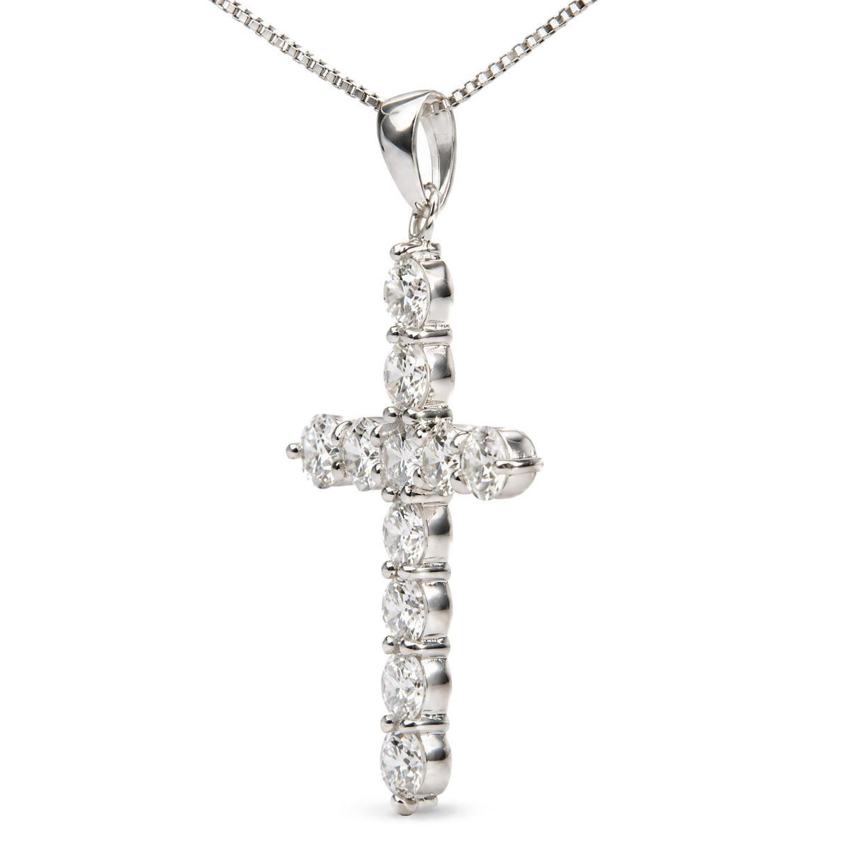 Close-up of 18K white gold cross pendant with prong-set round lab-grown diamonds