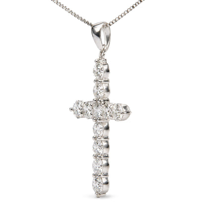 Close-up of 18K white gold cross pendant with prong-set round lab-grown diamonds