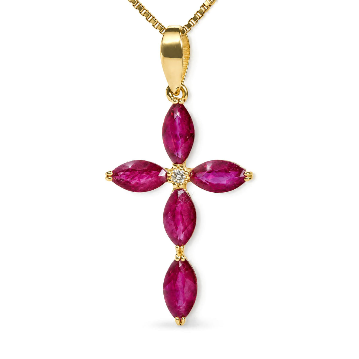 Close-up front view of a yellow metal necklace pendant featuring a cross design with marquise-shaped red gemstones and a round white gemstone at the center, shown against a white background.